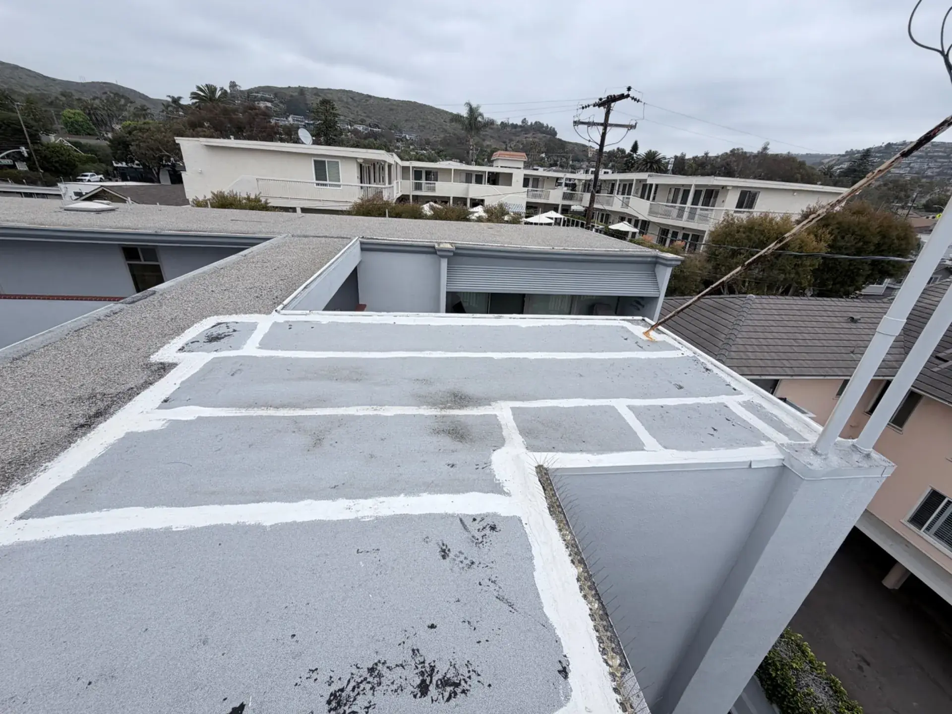 Flat Roof Leaks in Orange County: Patch, Recoat, or Replace?