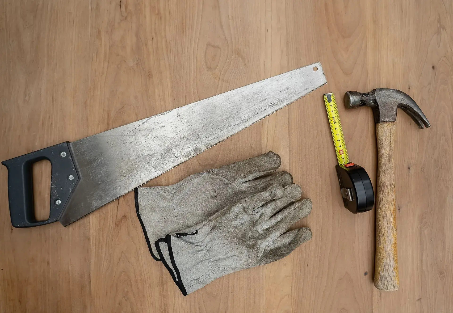 Carpentry tools laid out on a TMJ Construction job site in Orange County